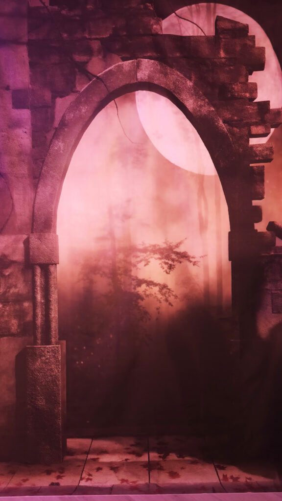 Photo wall in Trinidad room, with red led lights swiched on in Mueete studio